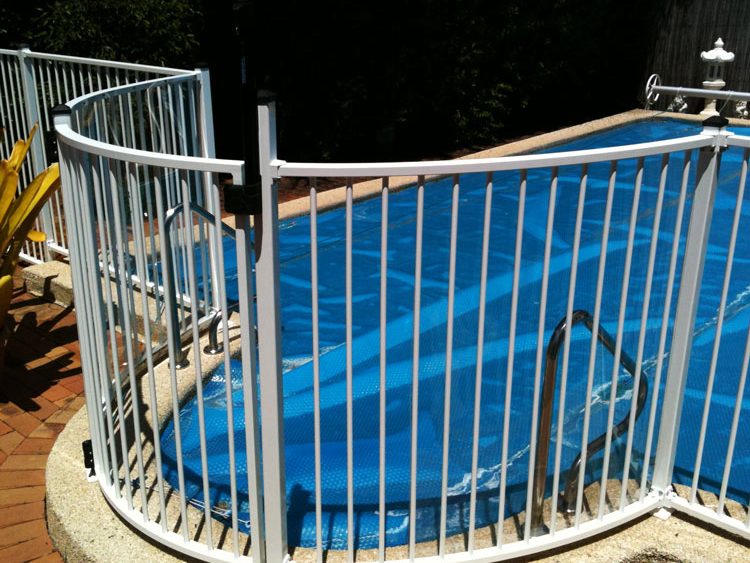 Pool fence special panels are manufactured for initial installation.